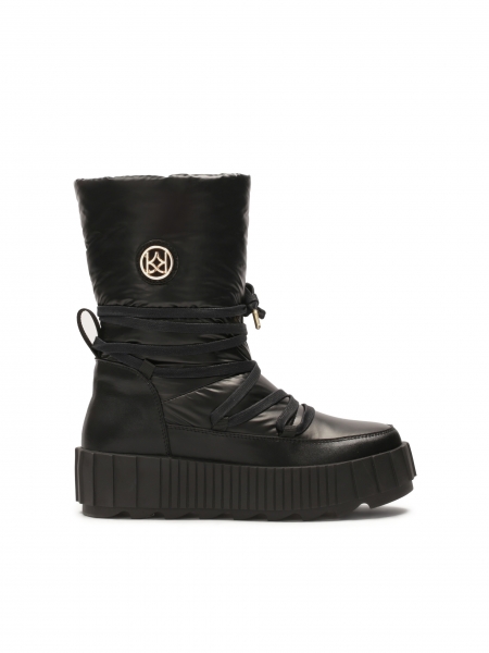 Insulated black snow boots with slip-on upper  DAGE