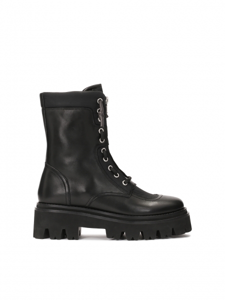 Black boots with a high upper on a trefoil sole  KS SALVA