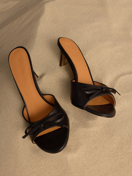 Black mules on a high stiletto heel  AUDE