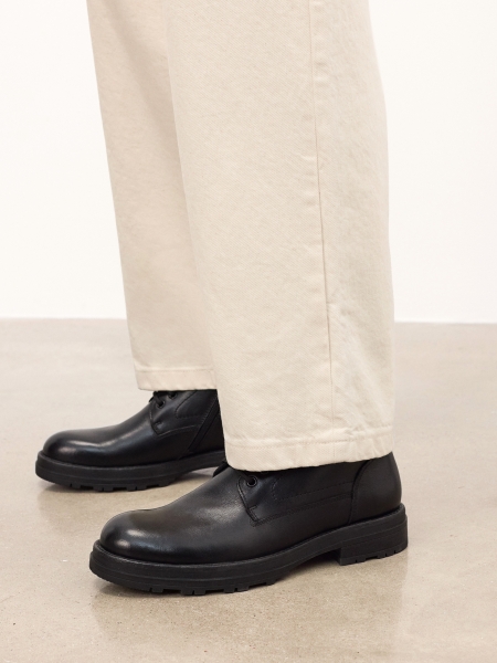 Black boots with zipper and binding PAVELLI