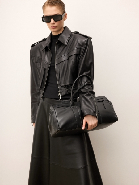 Black handbag made of soft natural leather with elongated cut KS VIORNE 