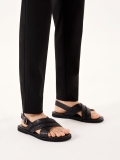 Leather black sandals with a buckle OZERNOY