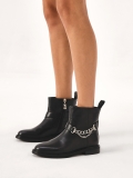 Flat zip-up boots decorated with chain CORALIE