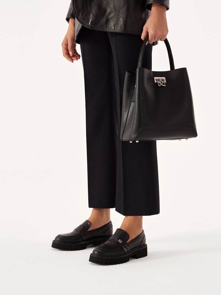 Black shoes on a treaded sole ESSEN