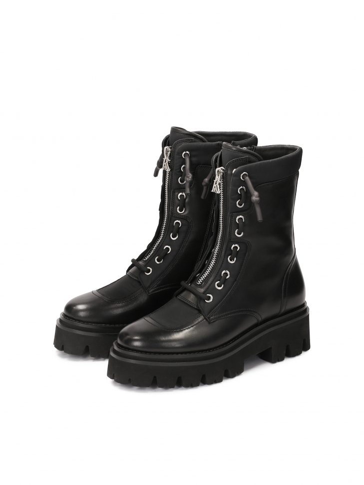 Black boots with a high upper on a trefoil sole  KS SALVA