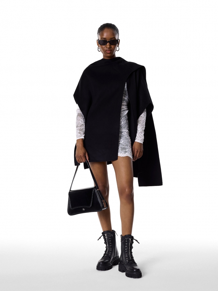 Black boots with a high upper on a trefoil sole  KS SALVA