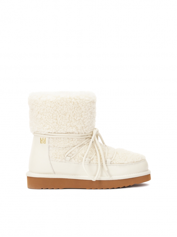 Cream snow boots on a brown sole ZULA