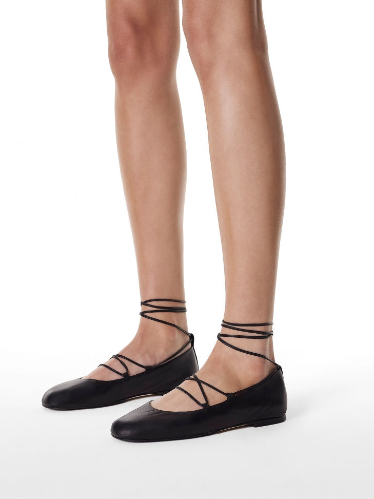 Black ballerinas tied around the ankle  KS AVRIL