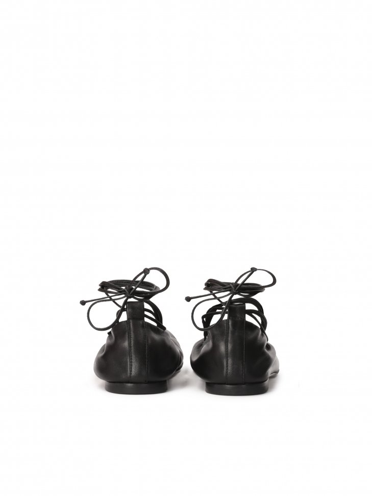Black ballerinas tied around the ankle  KS AVRIL