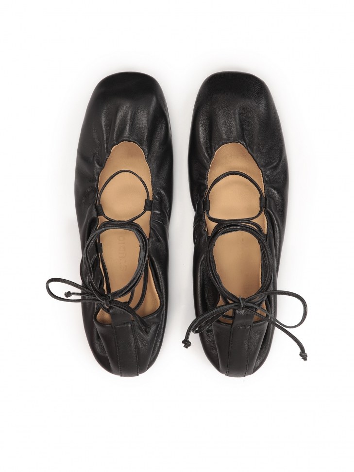 Black ballerinas tied around the ankle  KS AVRIL