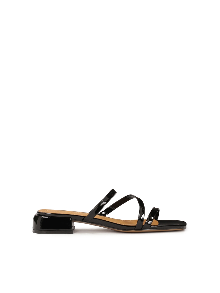 Mules on a flat sole made of patent leather TULIA